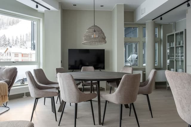 Ski-in ski-out apartment in Åre with sleek interior, fully equipped kitchen, modern bathroom and mountain views