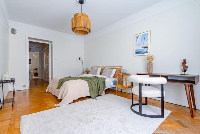 Spacious living room with sofa bed in Vasastan, Stockholm.