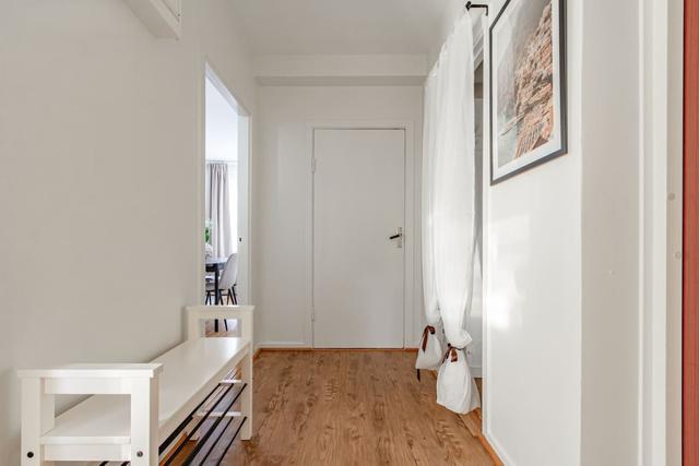 Living room with dining area in Sundbyberg