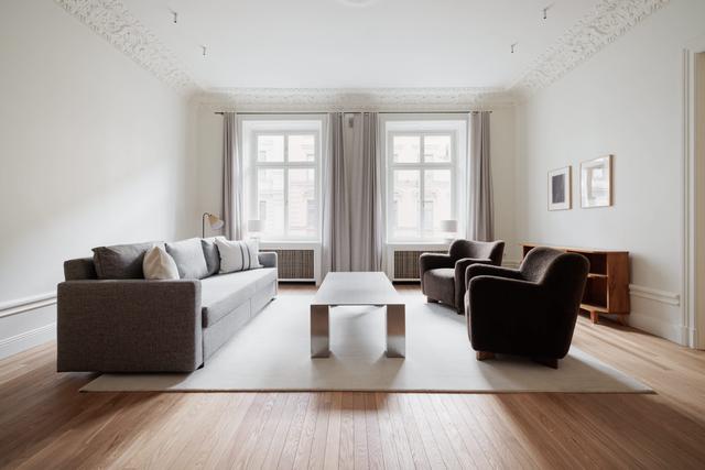 Scandinavian-style apartment interior with private balcony in Östermalm, Stockholm