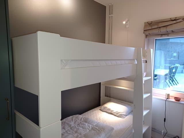 Modern apartment in Åre near the square with fireplace, private sauna, balcony and easy access to ski lifts.