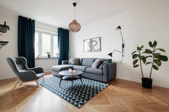 Bright interior of a comfortable Sundbyberg flat near Stockholm surrounded by greenery