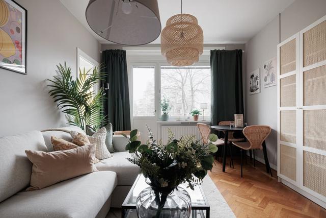 Spacious and bright living area in Stockholm apartment.