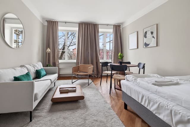 Cozy studio interior in St. Eriksplan, Stockholm, located in a historic building.