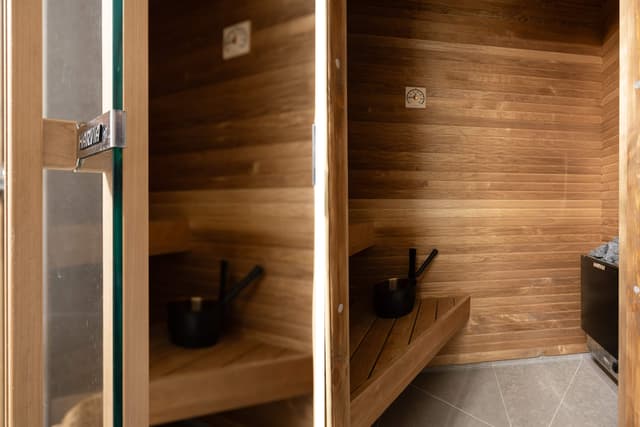 Interiör av Åre-lägenhet med privat bastu, gemensam lounge och skidförråd