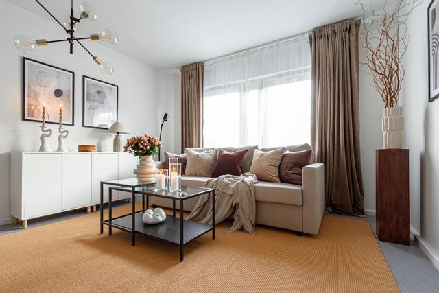 Living room with sofa bed in Södermalm studio apartment.