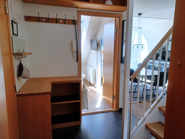 Modern etagelägenhet i centrala Åre med sjöutsikt, takterrass och privat bastu nära skidliftar