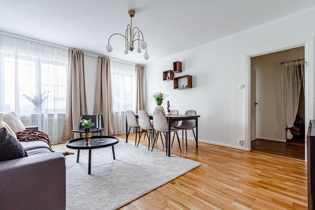 Living room with dining area in Sundbyberg