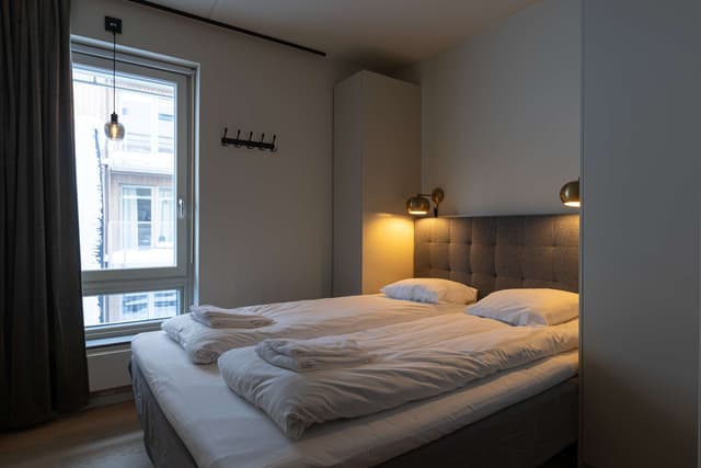 Lägenhetsinteriör i Åre, modernt kök, smart planlösning, två sovrum och egen bastu