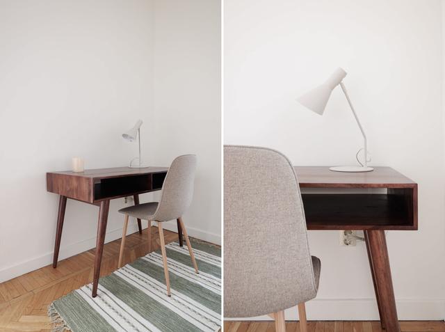 Ljust lägenhetsinteriör i Sundbyberg med minimalistisk inredning och grönskande omgivningar