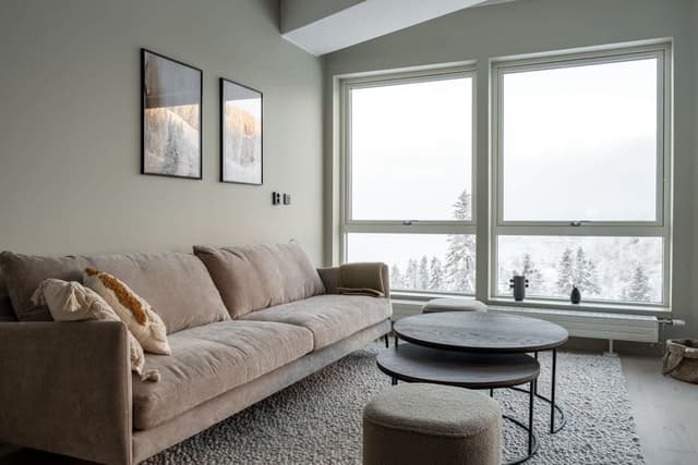 Ski-in ski-out apartment in Åre with sleek interior, fully equipped kitchen, modern bathroom and mountain views