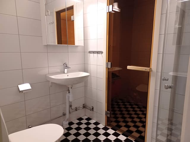 Central Åre apartment with private sauna, ski storage and drying cabinet, near village and mountain trails.