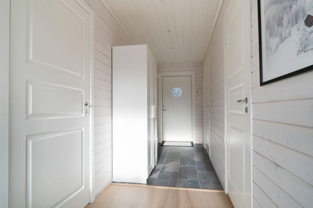 Cozy living room in Tegefjäll apartment with natural light.