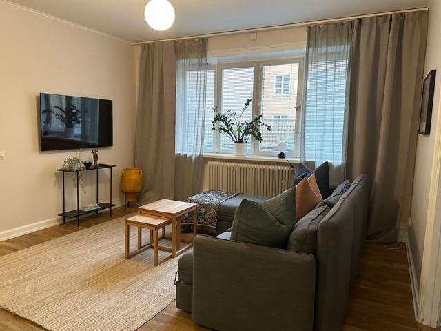 Master bedroom with king size bed in Södermalm apartment