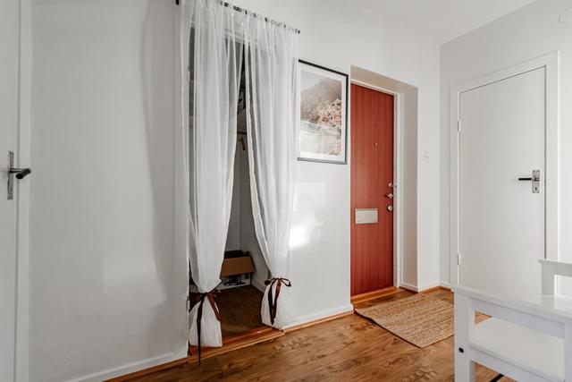 Living room with dining area in Sundbyberg