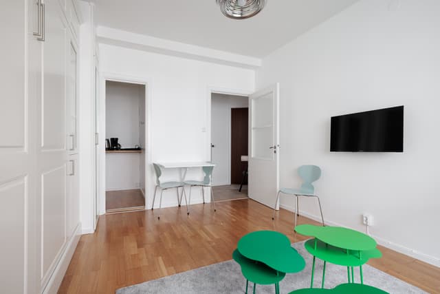 Interior of cozy Hornstull studio apartment near scenic waterfront paths