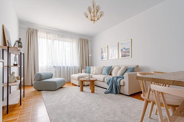 Bright living room in Sundbyberg apartment.