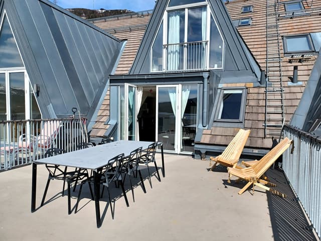Modern etagelägenhet i centrala Åre med sjöutsikt, takterrass och privat bastu nära skidliftar