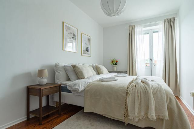 Bright living room in Sundbyberg apartment.