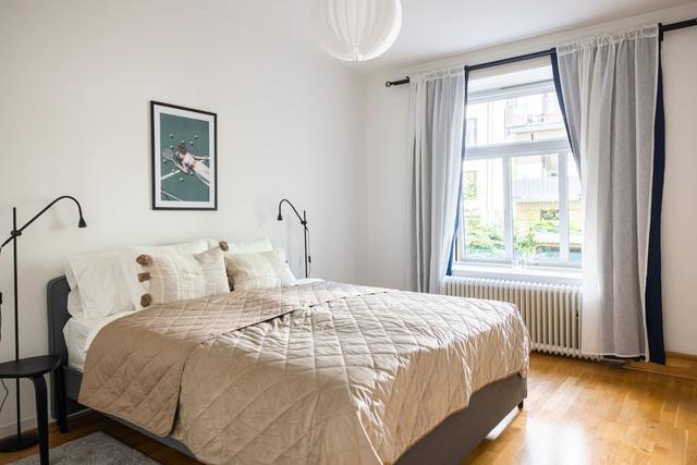 Spacious living room in Gothenburg apartment.