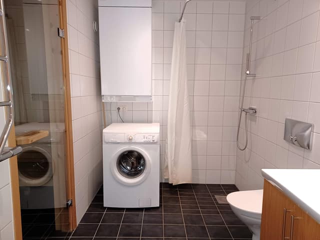 Skidlägenhet nära Åre torg med privat bastu, tre sovrum, skidförvaring och garageparkering