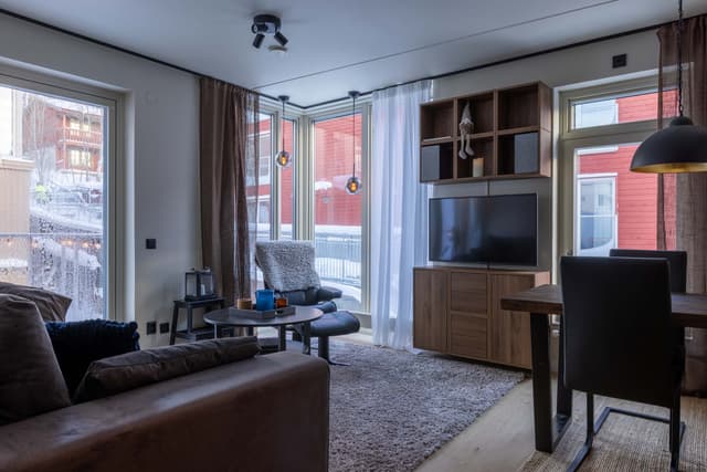 Lägenhetsinteriör i Åre, modernt kök, smart planlösning, två sovrum och egen bastu