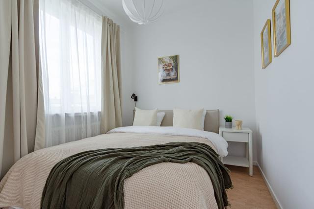 Bright living room in Sundbyberg apartment.