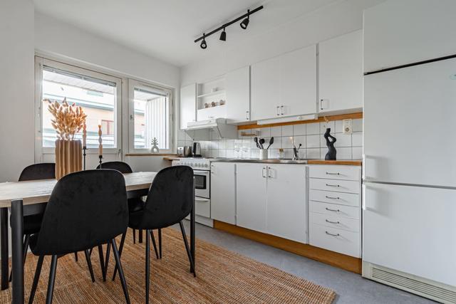 Living room with sofa bed in Södermalm studio apartment.