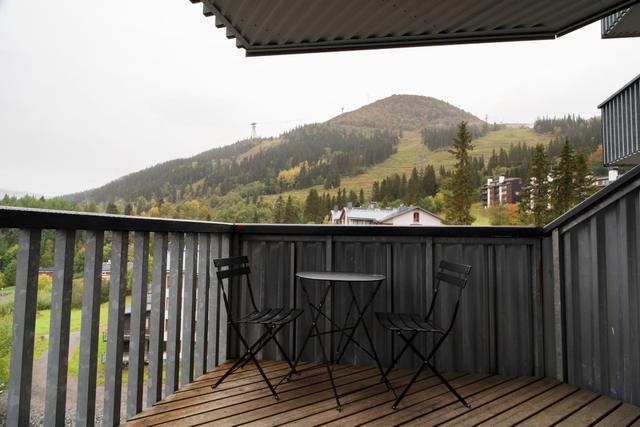 Cozy Åre apartment with ski-in/ski-out access and stunning views.