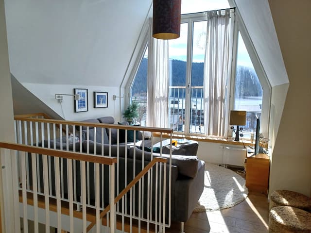 Modern etagelägenhet i centrala Åre med sjöutsikt, takterrass och privat bastu nära skidliftar