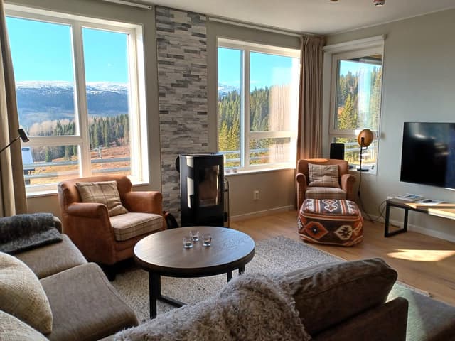 Ski-in/ski-out family apartment in Sadeln with sauna, indoor fireplace and south-facing patio