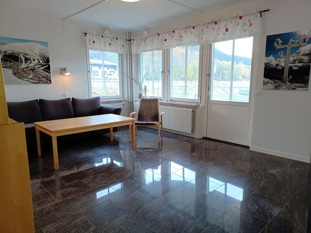 Central Åre apartment with private sauna, ski storage and drying cabinet, near village and mountain trails.