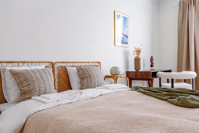 Spacious living room with sofa bed in Vasastan, Stockholm.