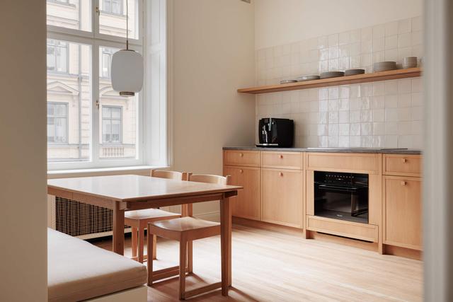 Scandinavian-style apartment interior with private balcony in Östermalm, Stockholm