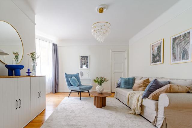 Spacious living room with sofa bed in Vasastan, Stockholm.