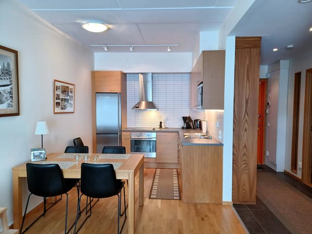 Central Åre apartment close to ski lifts and village restaurants, with ski storage and free garage parking