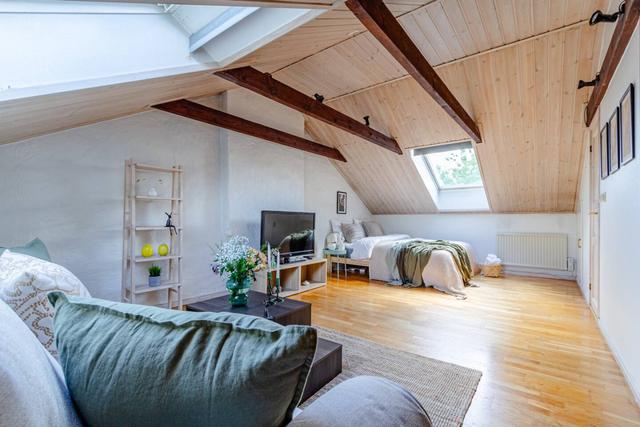 Spacious loft apartment with equipped kitchen and comfortable living area in Stockholm