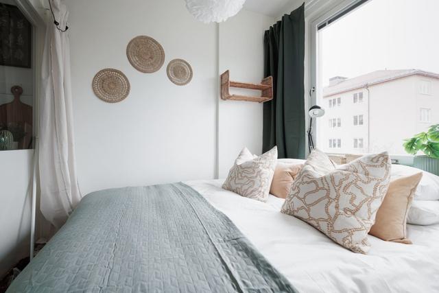 Spacious and bright living area in Stockholm apartment.