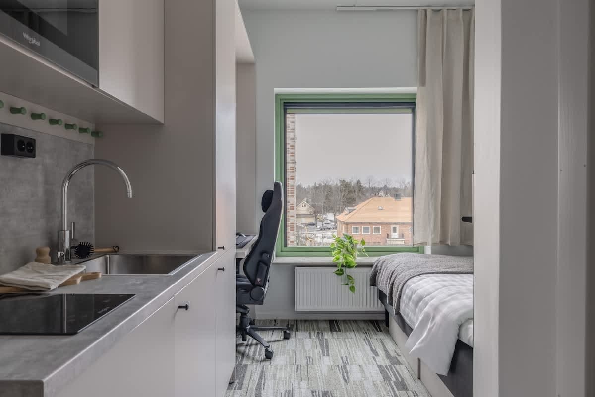 HomeX Hotel Täby delat kök och lounge i gemensam yta med terrass