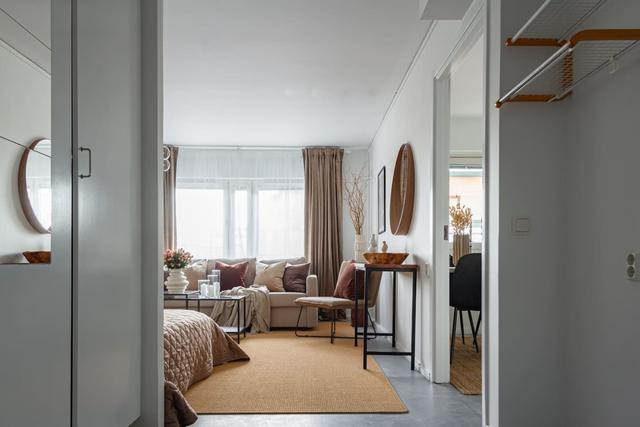 Living room with sofa bed in Södermalm studio apartment.