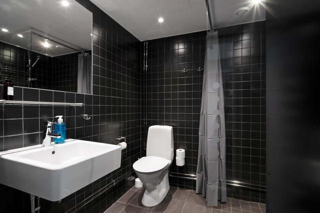 Mysigt vardagsrum i Åre skidstuga, Modernt kök i Åre semesterhem, Spa-liknande badrum i Åre