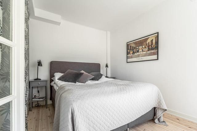 Södermalm Stockholmslägenhet med privat balkong och stadssilhuettutsikt