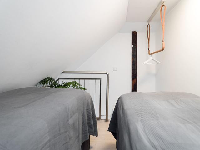 Bright attic apartment in Old Town Stockholm with modern design.