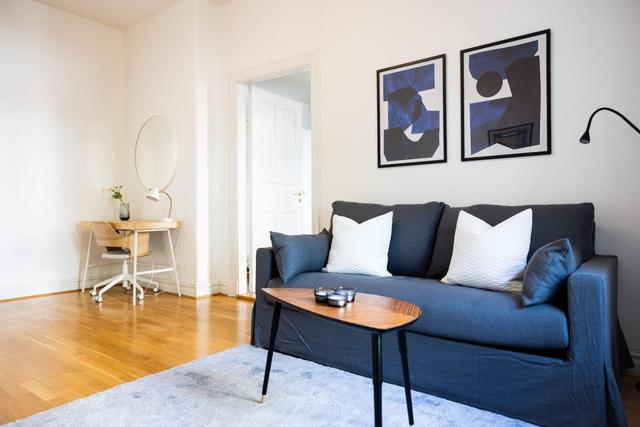 Spacious living room in Gothenburg apartment.