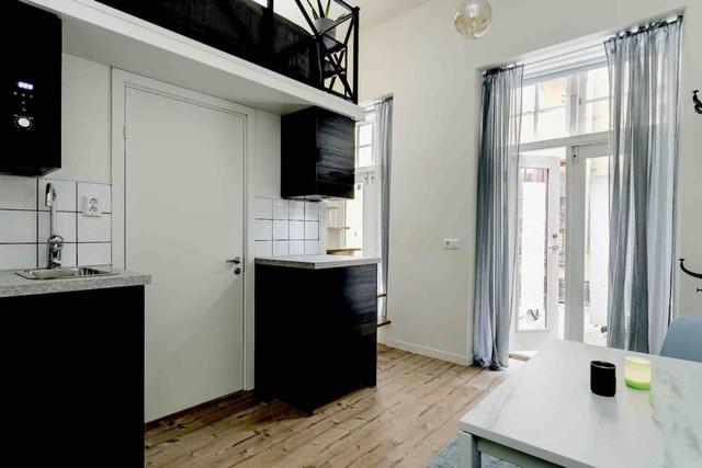 Studio apartment in Old Town Stockholm with kitchenette and loft beds