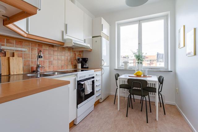 Bright living room in Sundbyberg apartment.