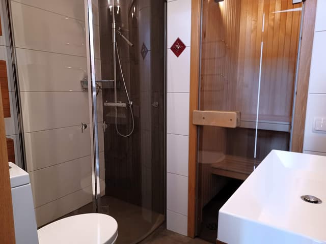 Modern etagelägenhet i centrala Åre med sjöutsikt, takterrass och privat bastu nära skidliftar
