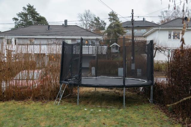 Family vacation house with trampoline and activity room near swimming lakes.