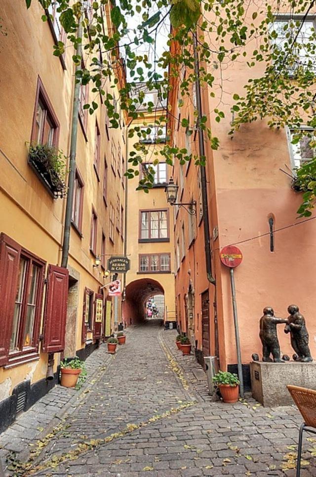 Loft apartment in Stockholm's Old Town with wooden beams.