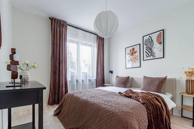 Living room with dining area in Sundbyberg